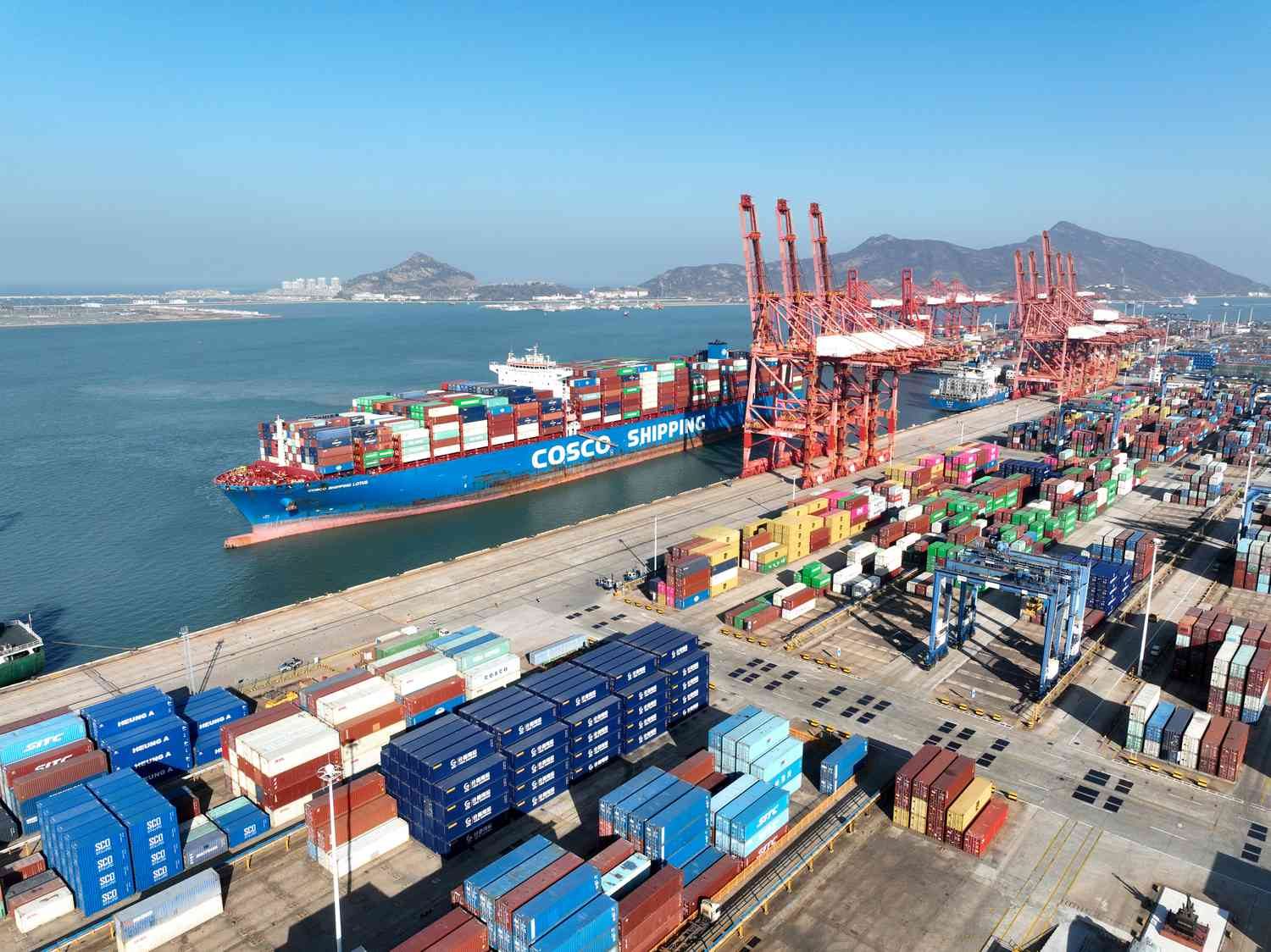 Port cranes handling import and export freight