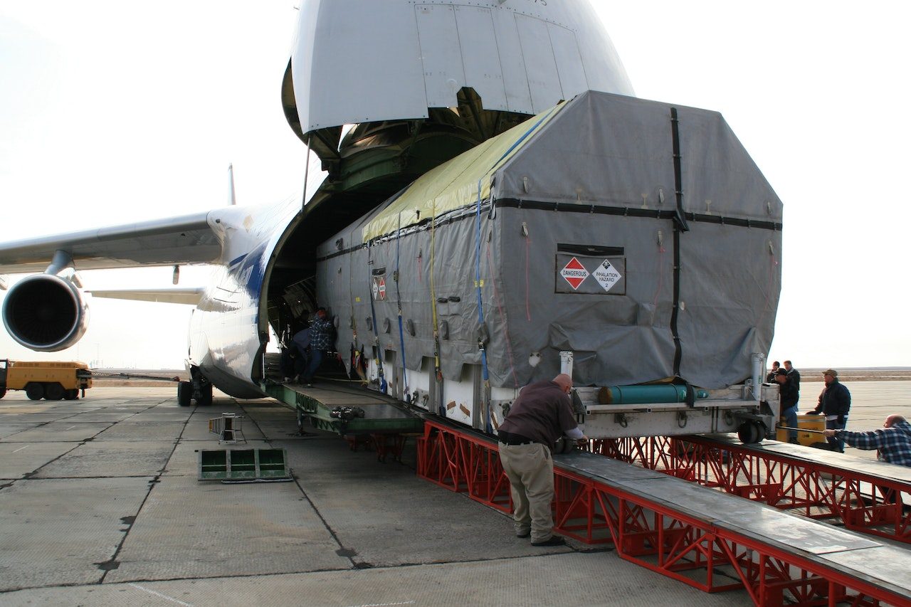 Large project cargo being managed and prepared for transport